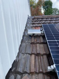 The Clean Plumber Roof Plumbing with lead flashing next to solar panel