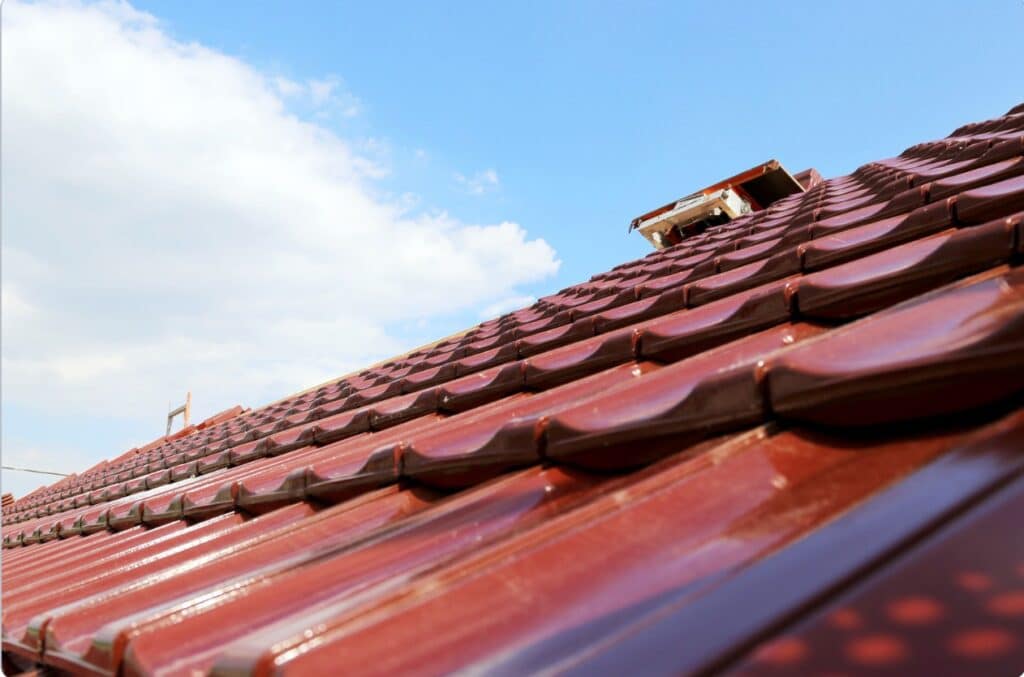 Roof Plumbing A close-up shot of a roof that has just been serviced by a roof plumber.