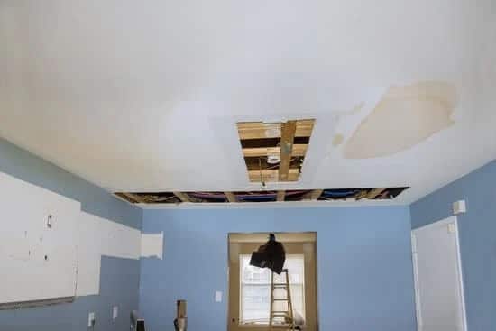 Roof plumbing Water damage on the ceiling caused by a leaking roof in heavy rain