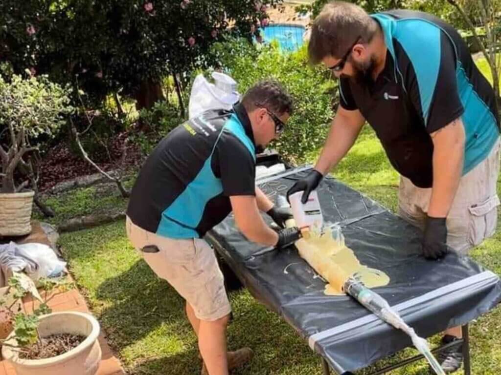 Trenchless-Pipe-Relining-Sydney-The-Clean-Plumber-2 cheap Plumber inspecting a drain for pipe relining services