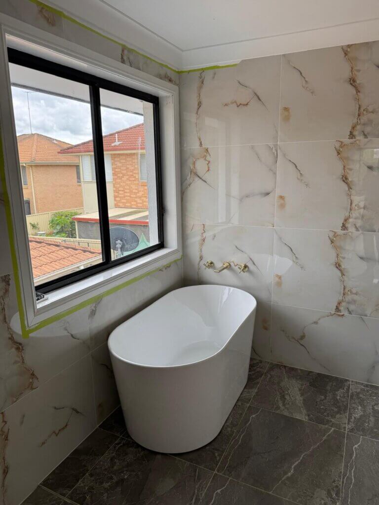 Transform your space with sleek fixtures, elegant tiles, and a fresh, modern aesthetic for a luxurious bathroom upgrade.